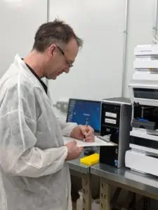 doctor writing in lab